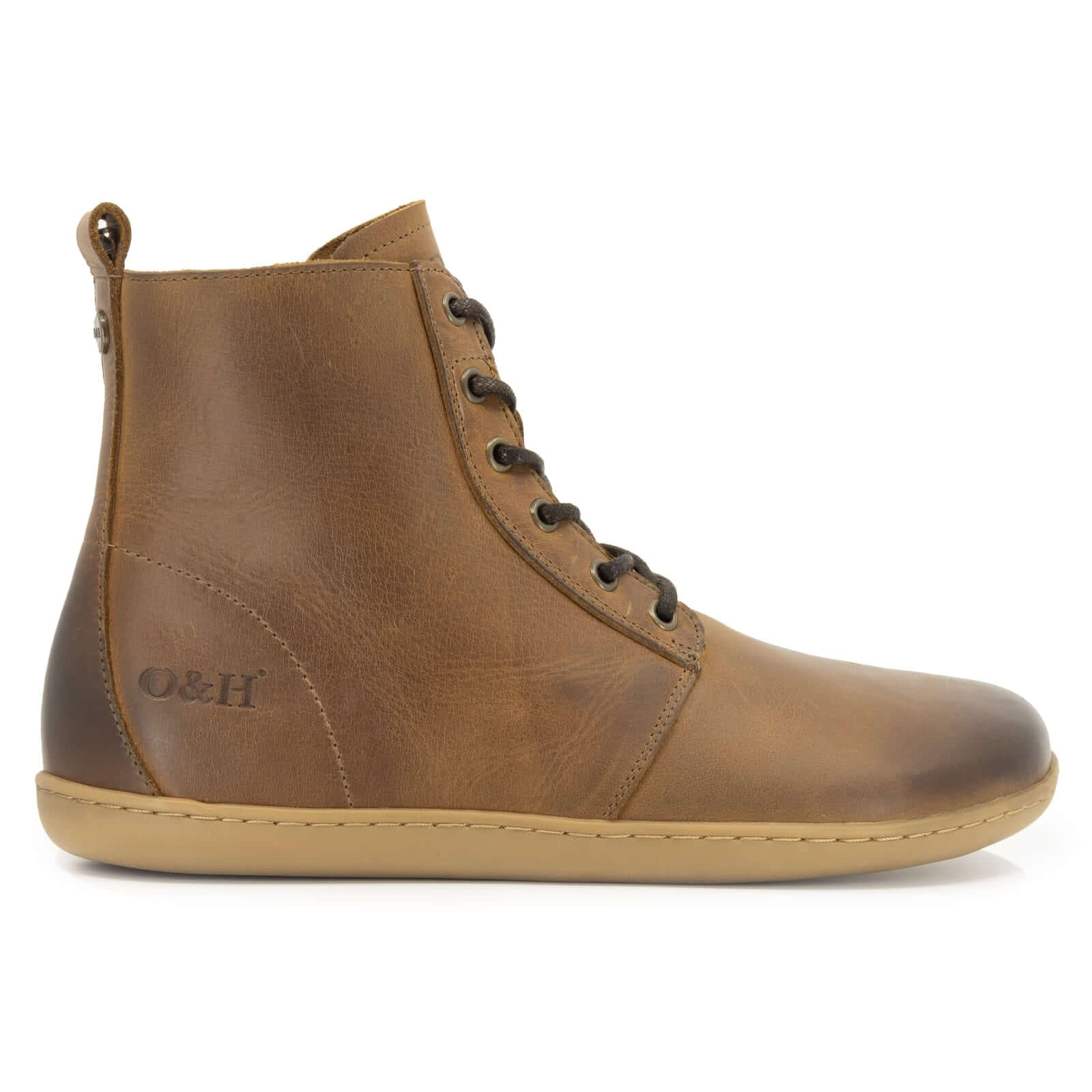 side profile view of cherry barefoot boots in tan showing O&H branding