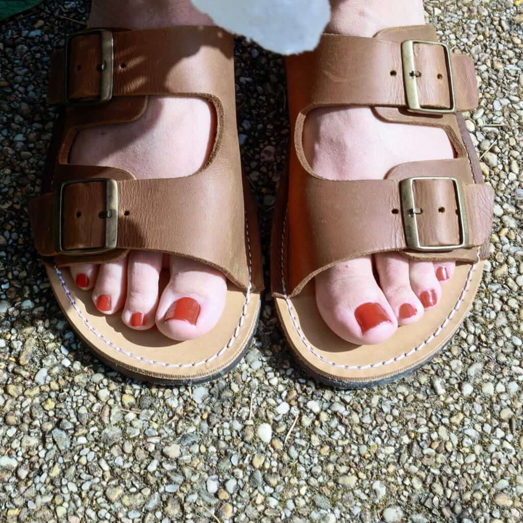 top down view of acacia womens leather barefoot sandals in tan showing the toe shape