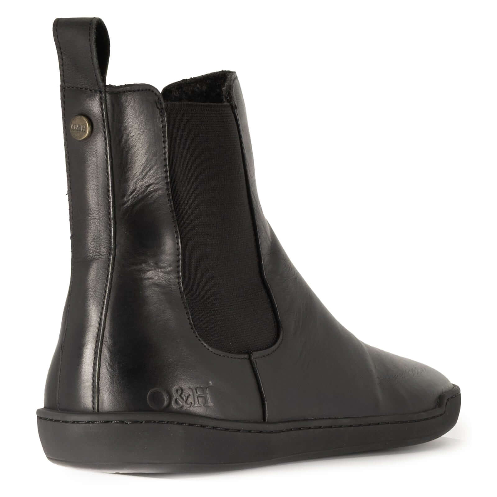 rear view image of black barefoot chelsea boots showing O&H branding on heel and brass pin