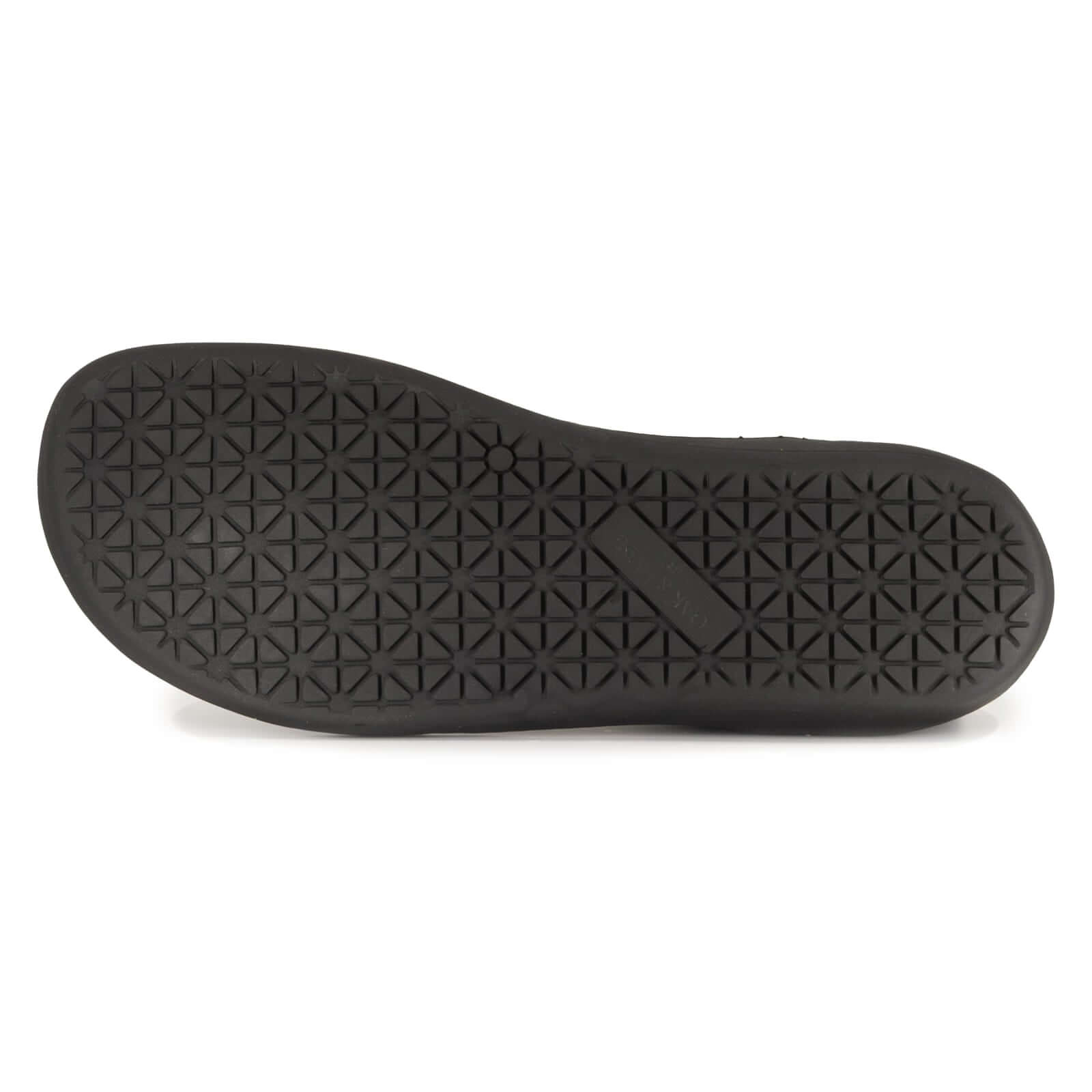 image showing zero drop outsole of black chelsea boots on white background