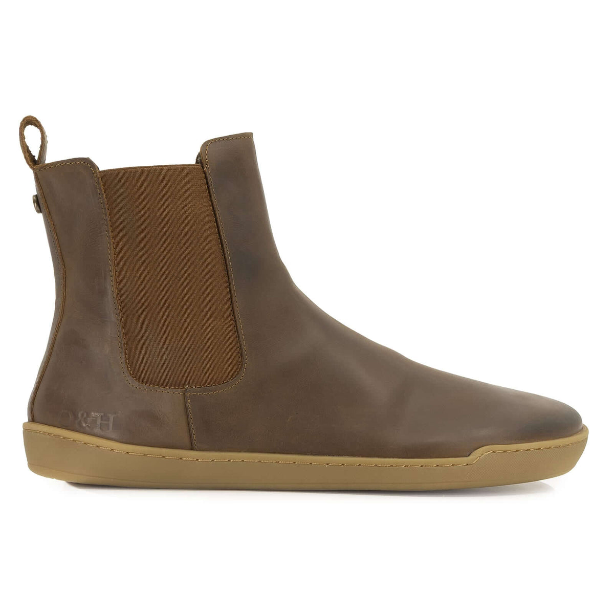 side on view of brown leather barefoot chelsea boot on white background