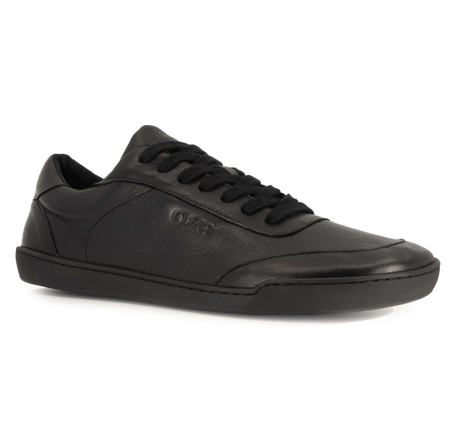 angled view of aspen all black leather barefoot trainers showing laces and branding