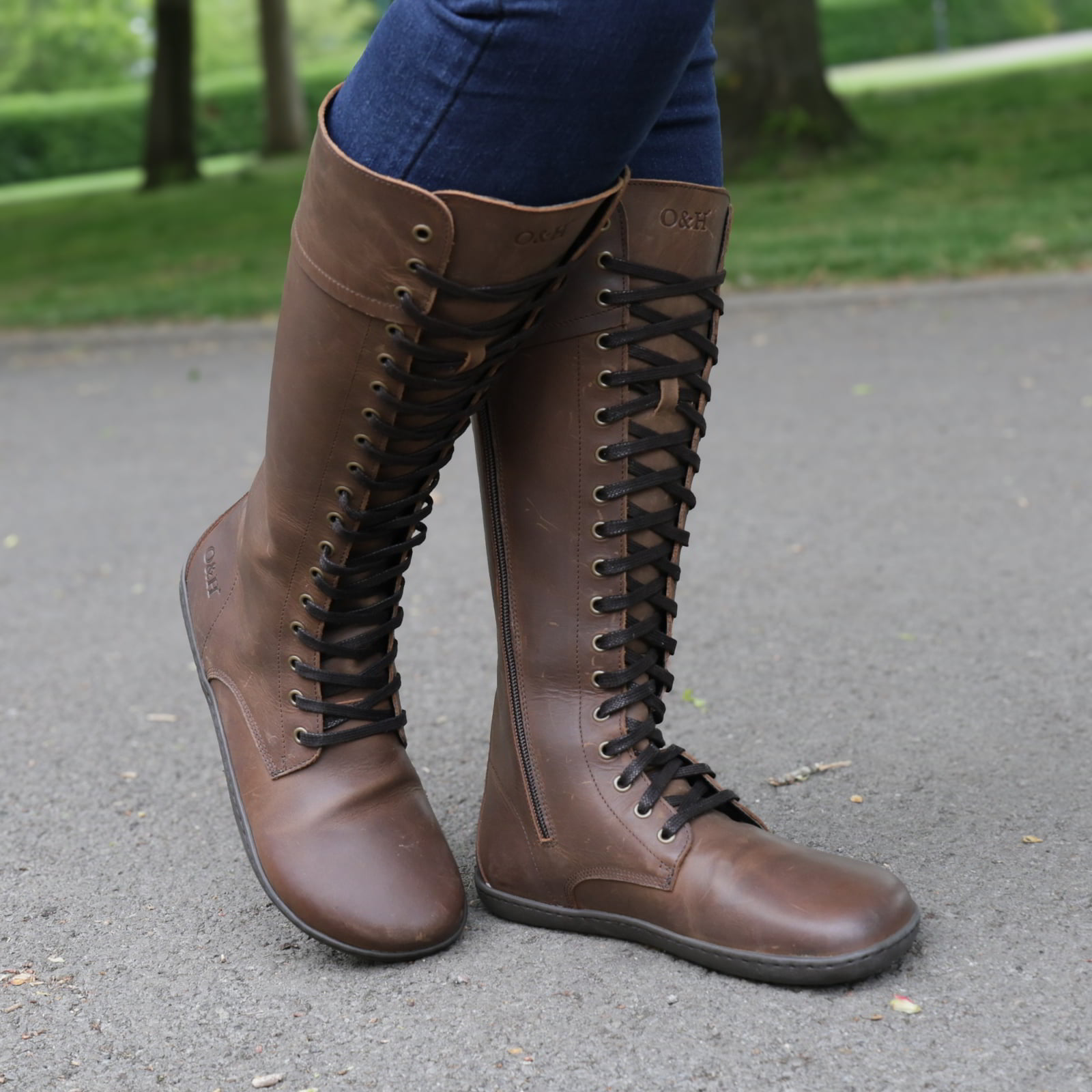beech 18 brown barefoot boots being worn by model showing a front view of laces