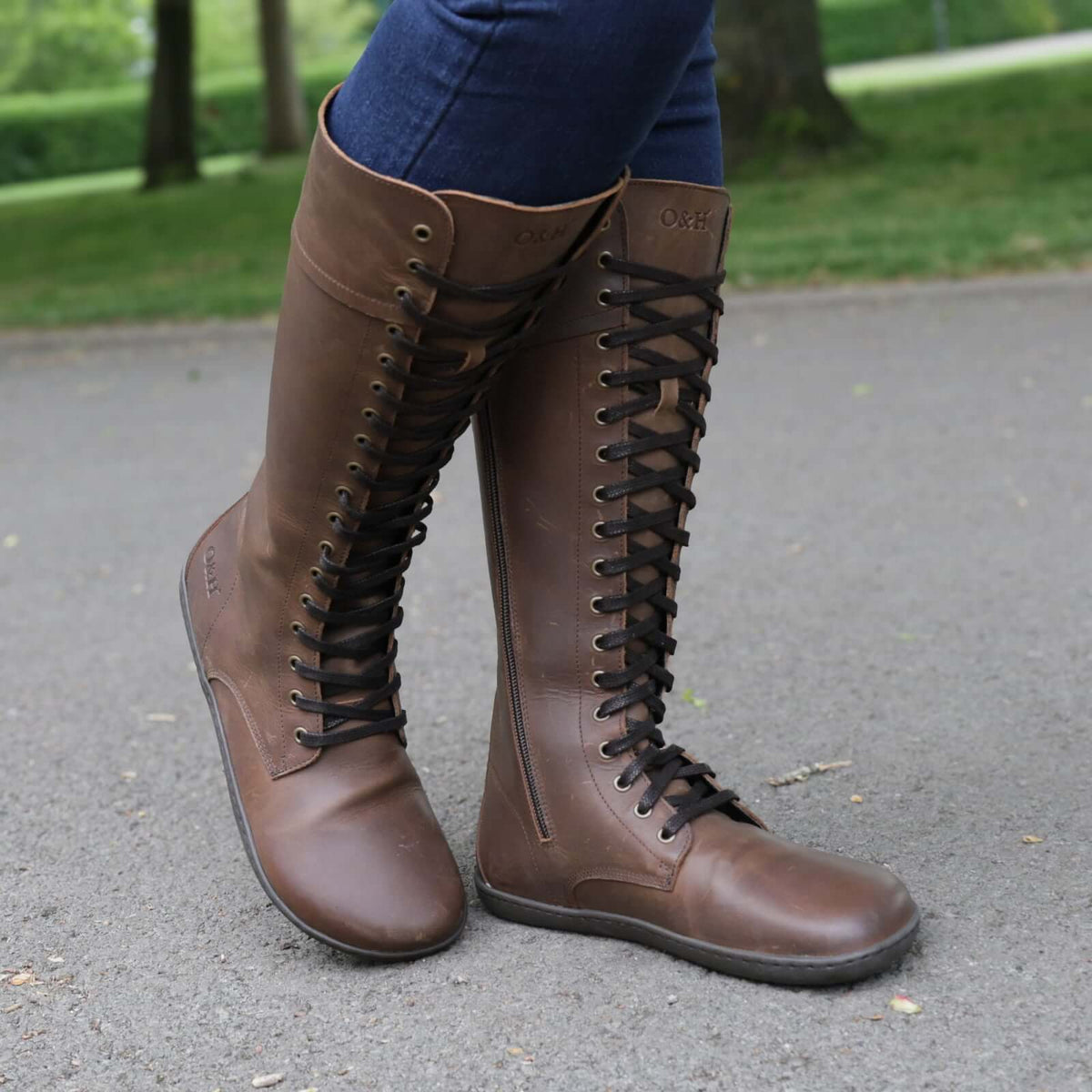 beech 18 brown barefoot boots being worn by model showing a front view of laces