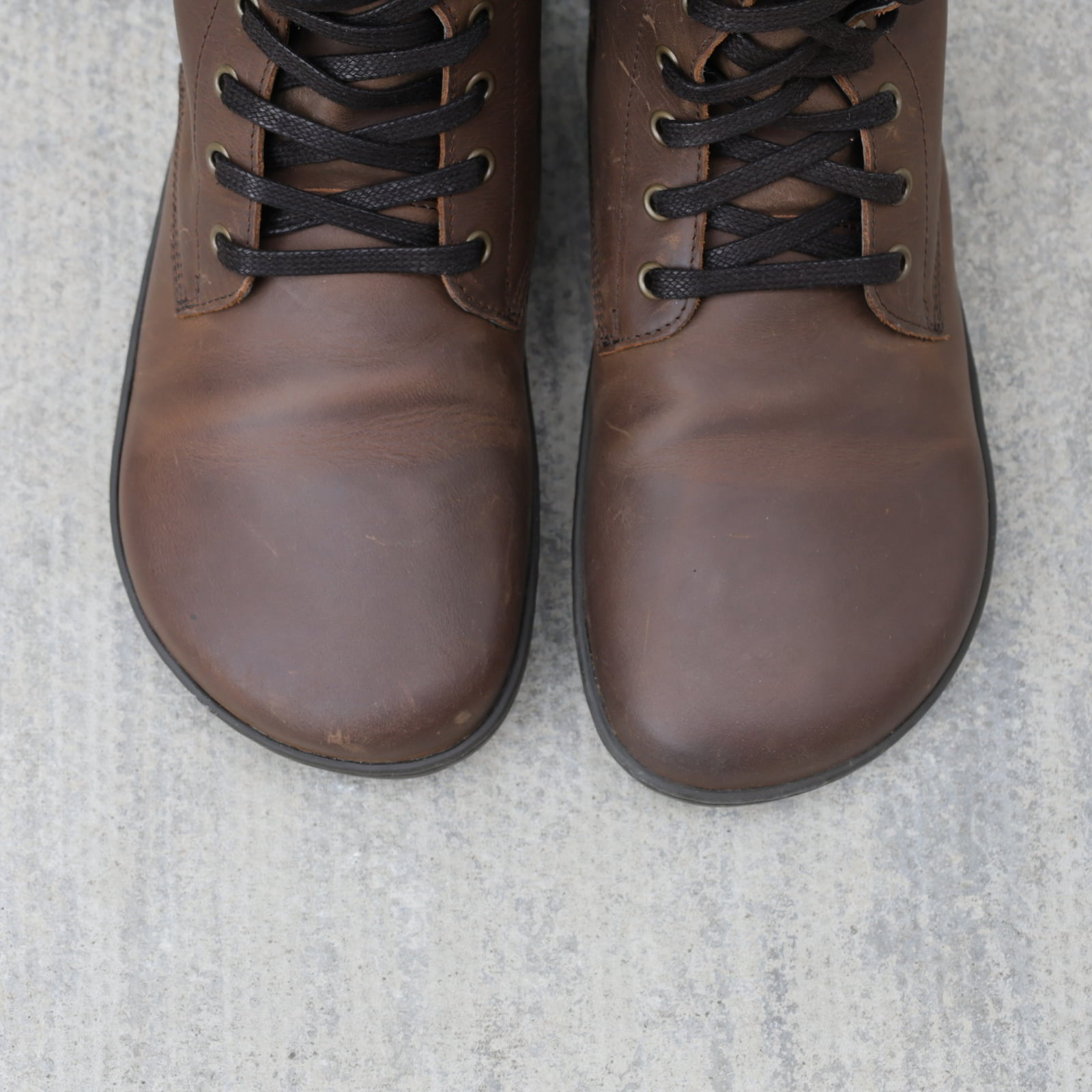 model wearing beech 18 brown barefoot boots top down view showing toe shape