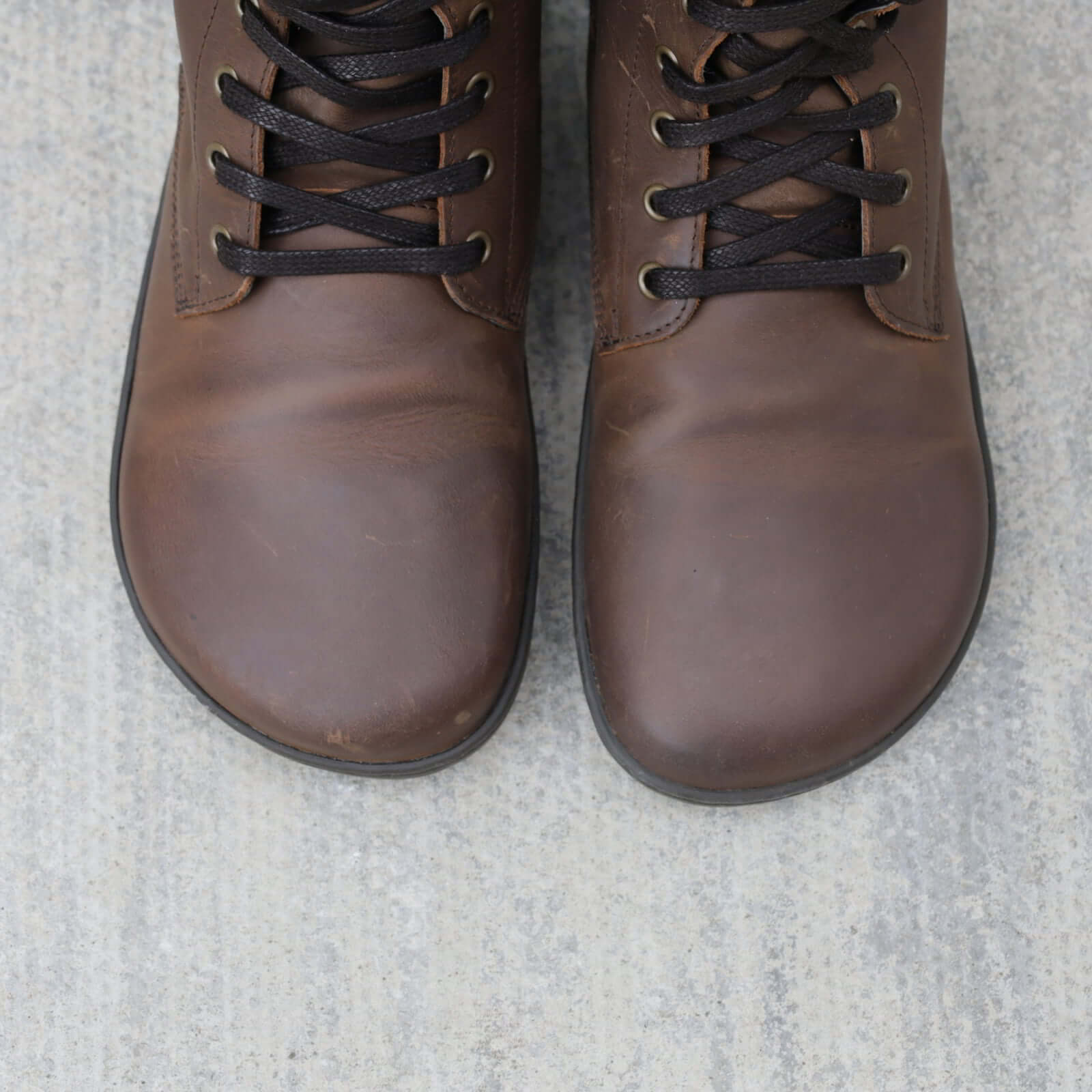 model wearing beech 18 brown barefoot boots top down view showing toe shape