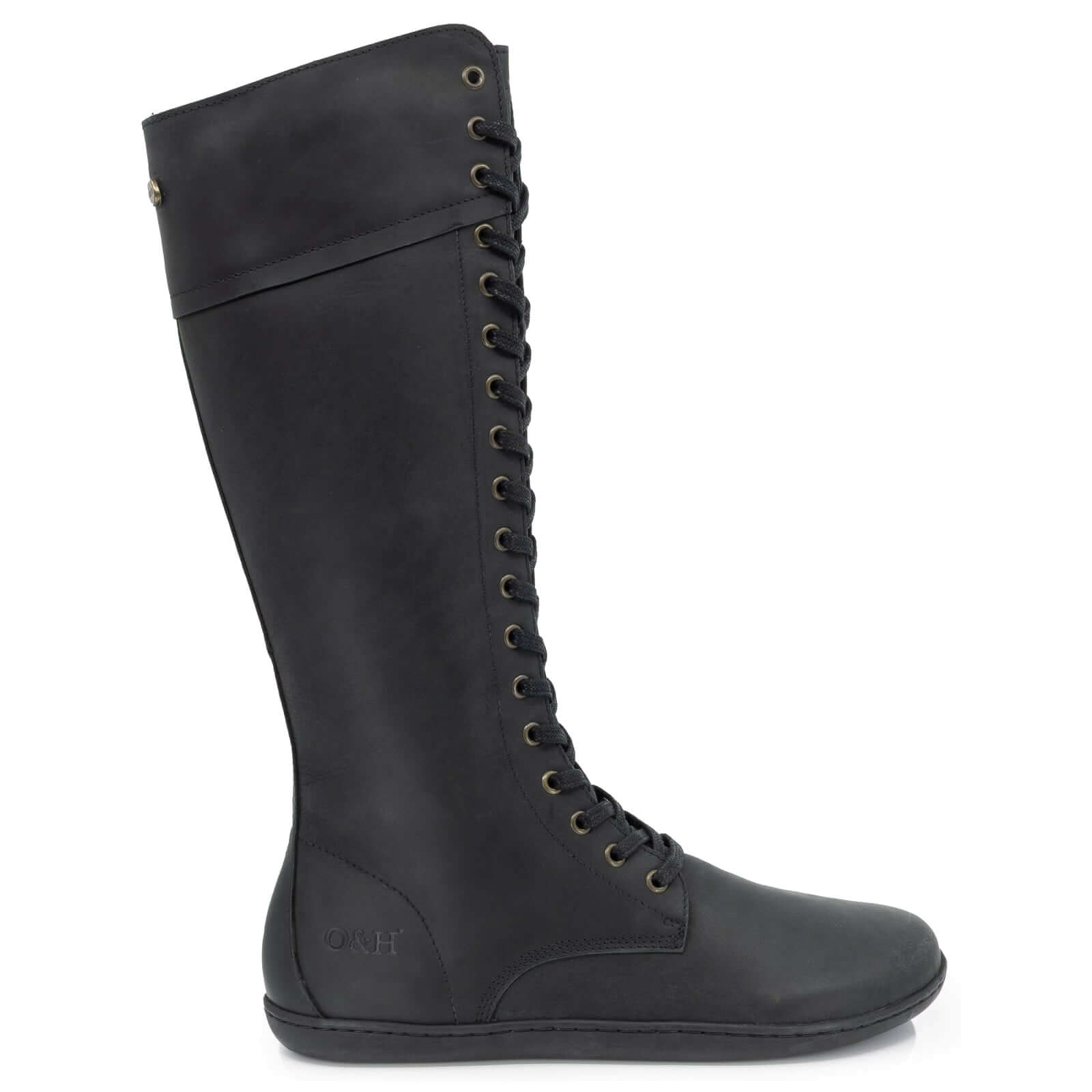 side view of tall lace up barefoot boots on white background