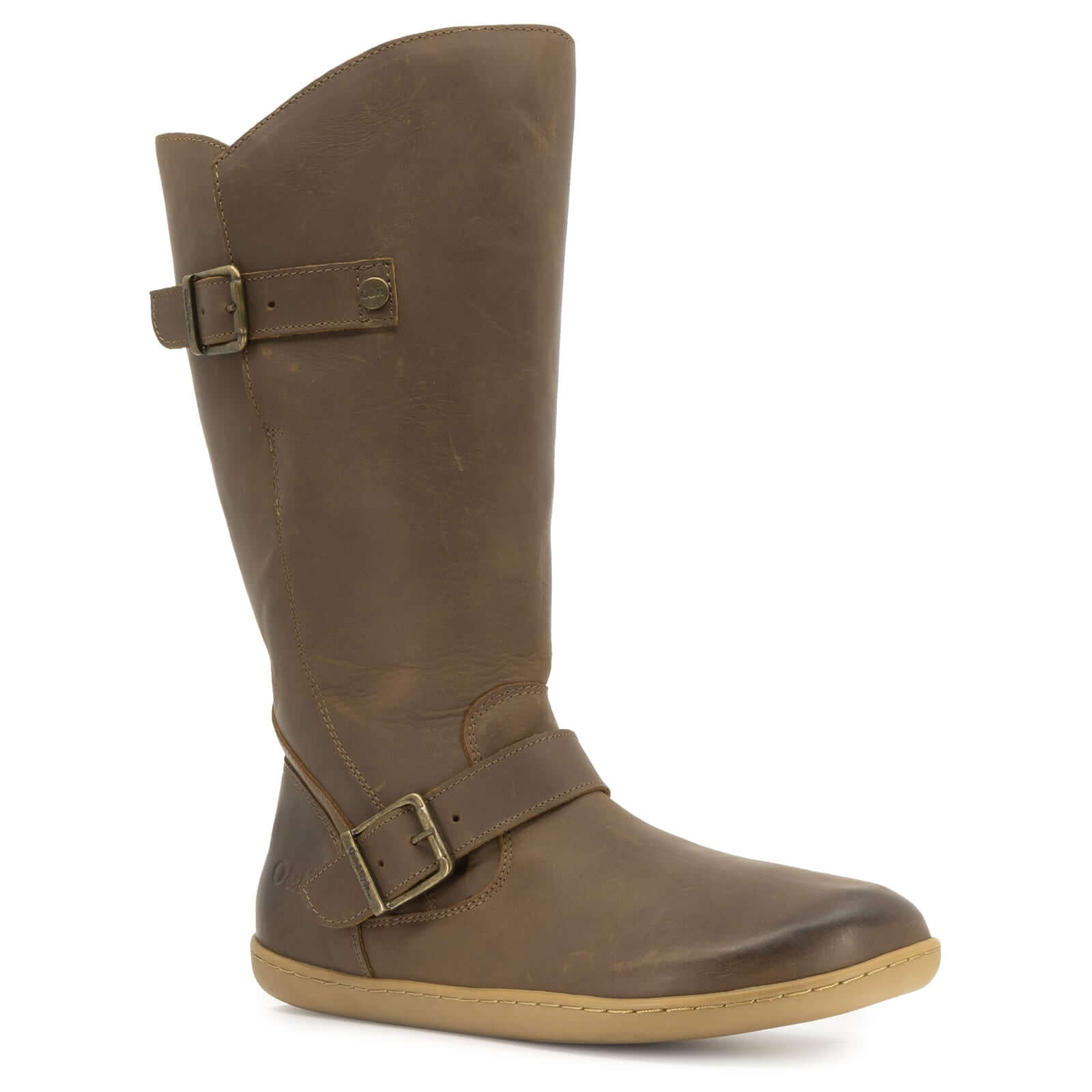 side angled view of cedar wide calf barefoot boots in brown showing leather upper and buckles