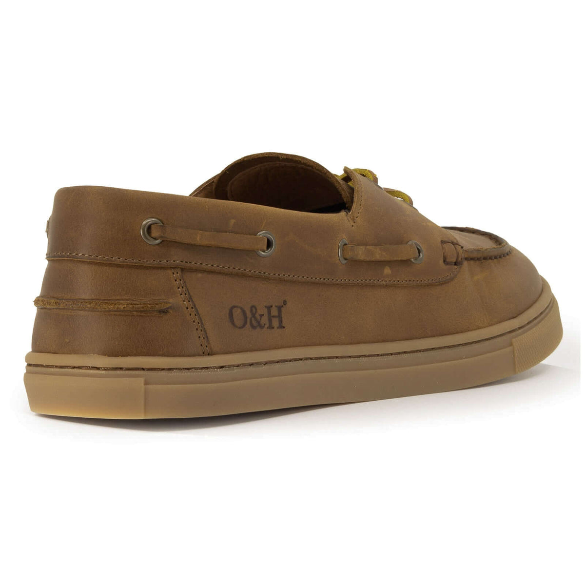 view of O&H logo on heel of tan barefoot shoes on white background