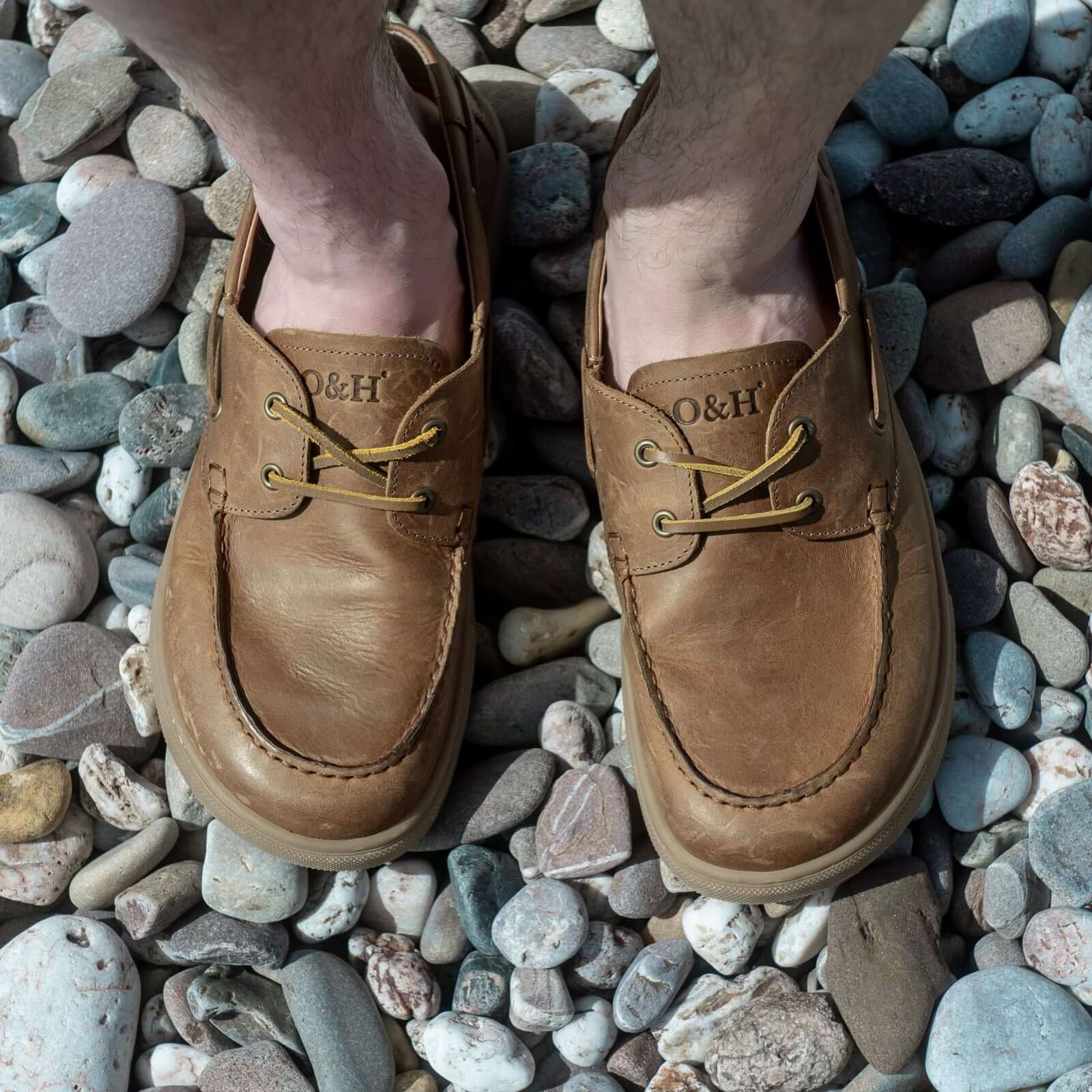 cypress barfoot shoes in tan being worn by model showing birds eye view of toe shape