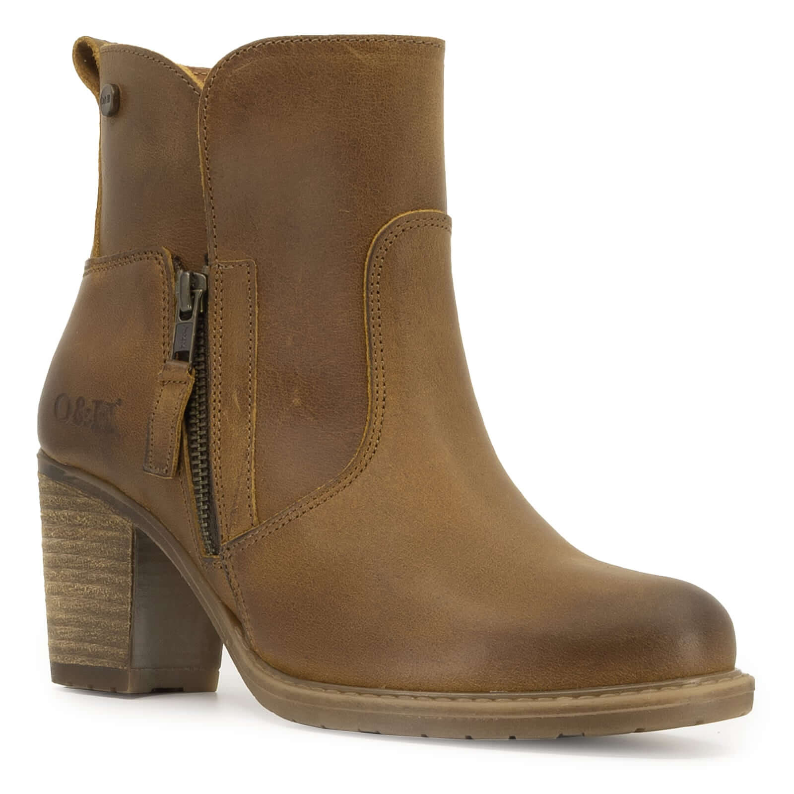 angled view of Eastside 2 western boots in tan showing toe and block heel
