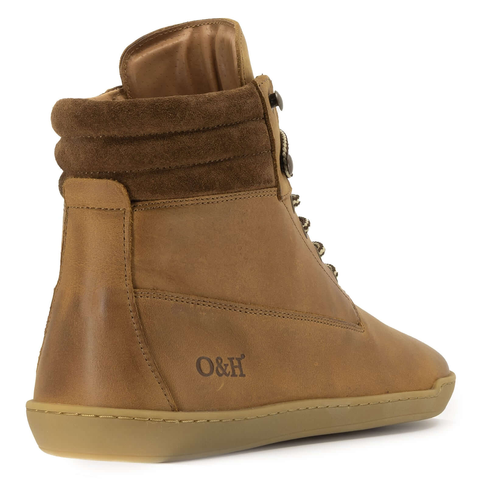 rear heel view of tan barefoot boots showing O&H embossed logo on white background