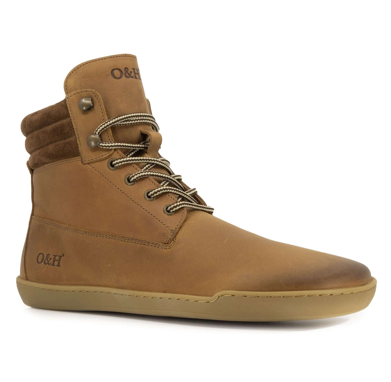 side angle of hawthorn tan barefoot boots showing logo on tongue and laces