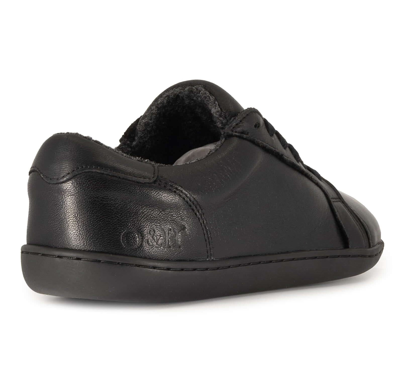 O&H logo on heel of black barefoot trainers on white background
