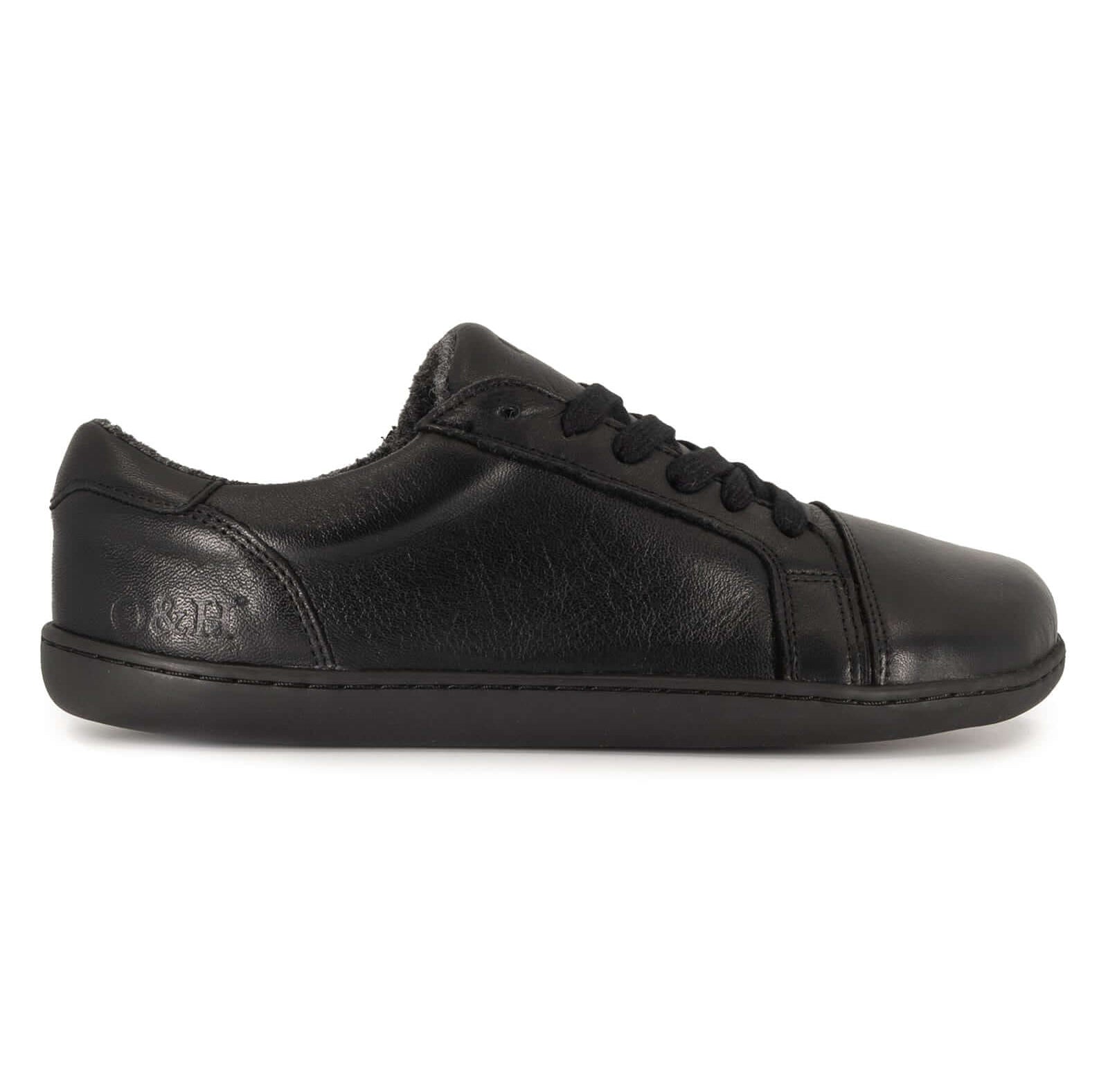 all black barefoot trainers side on angle on white background