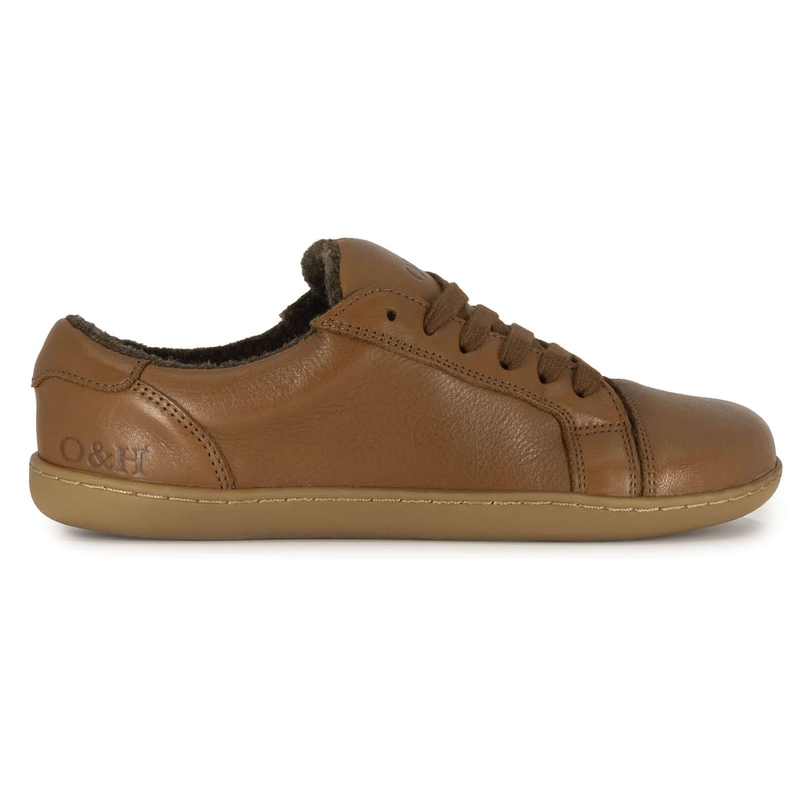 brown leather barefoot trainers side on view on white background
