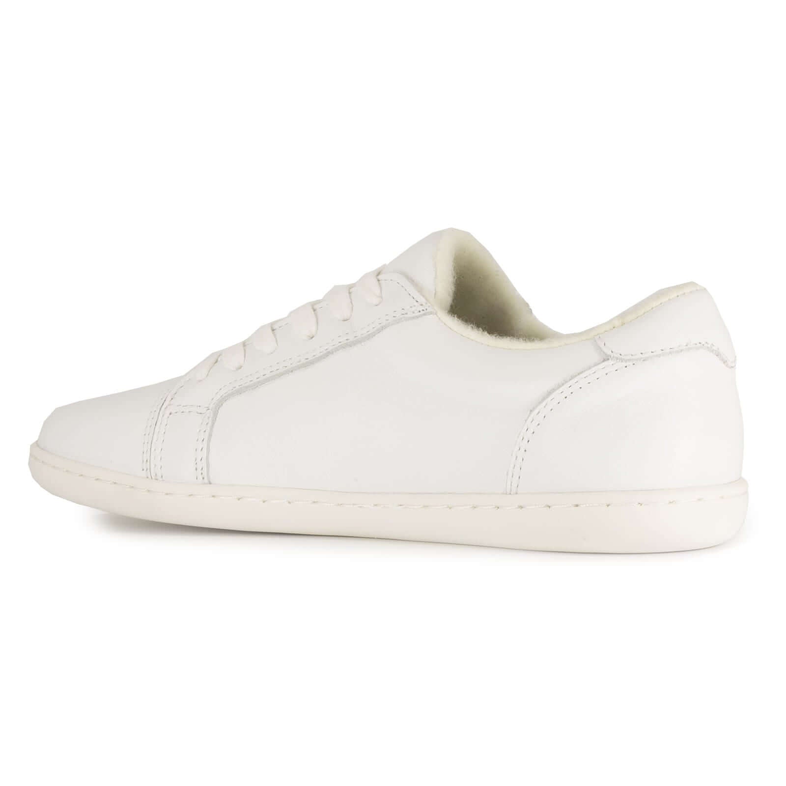 white barefoot trainers showing stitch panels and leather upper on white background