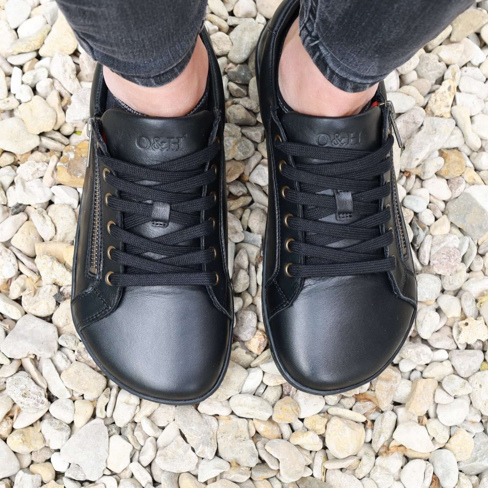 bird eye view of black hazel zip barefoot trainers showing the toe shape