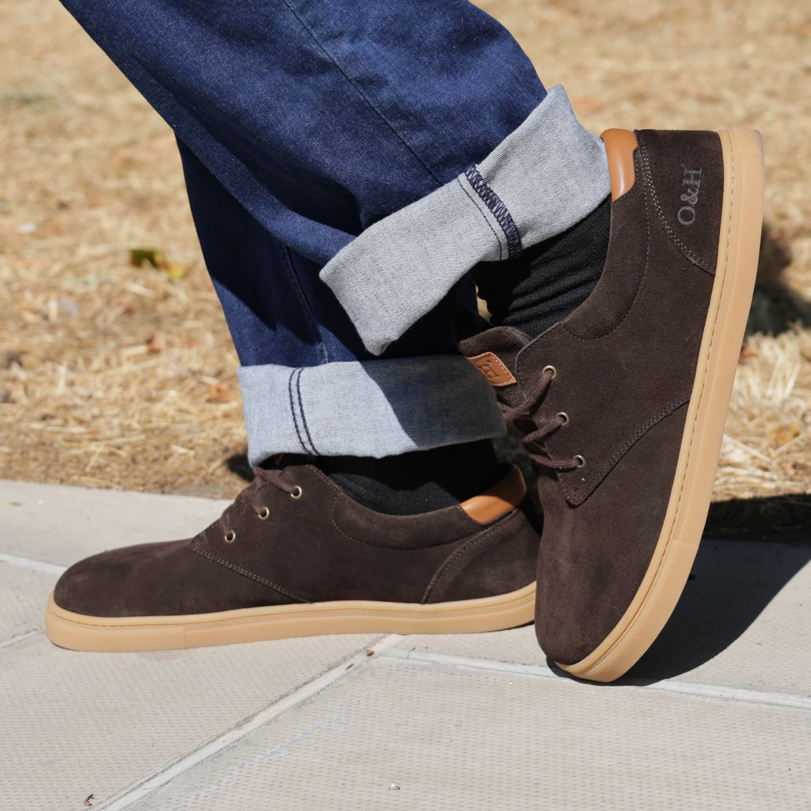 model standing outdoors wearing mens lawson barefoot shoes with jeans
