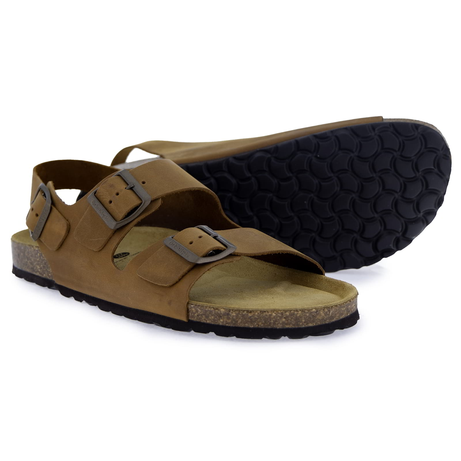 Pair of tan leather fisherman sandals, one showing the patterned black rubber sole and cork footbed