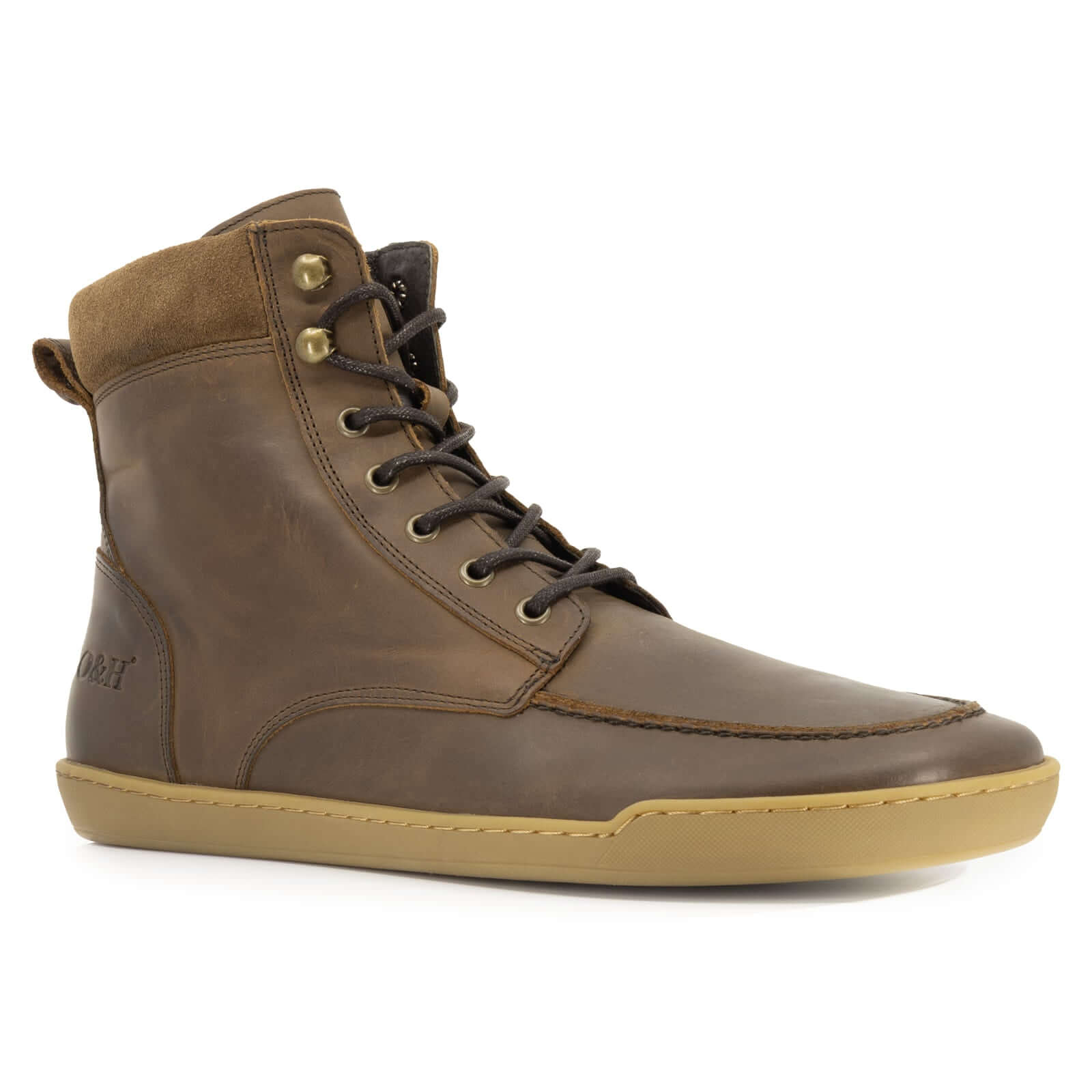 angled view of redwood barefoot boots in brown showing front lace