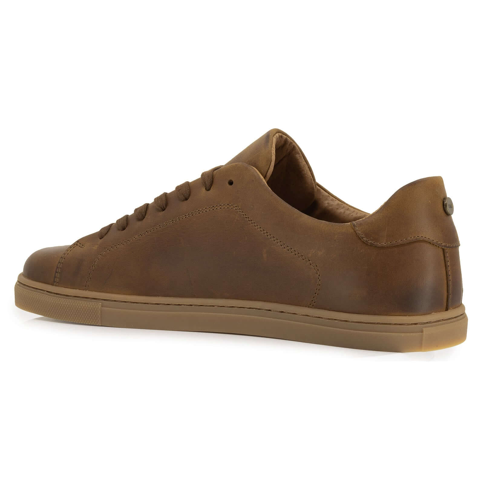 inside angled view of rowan barefoot shoes showing gum outsole and tan leather upper