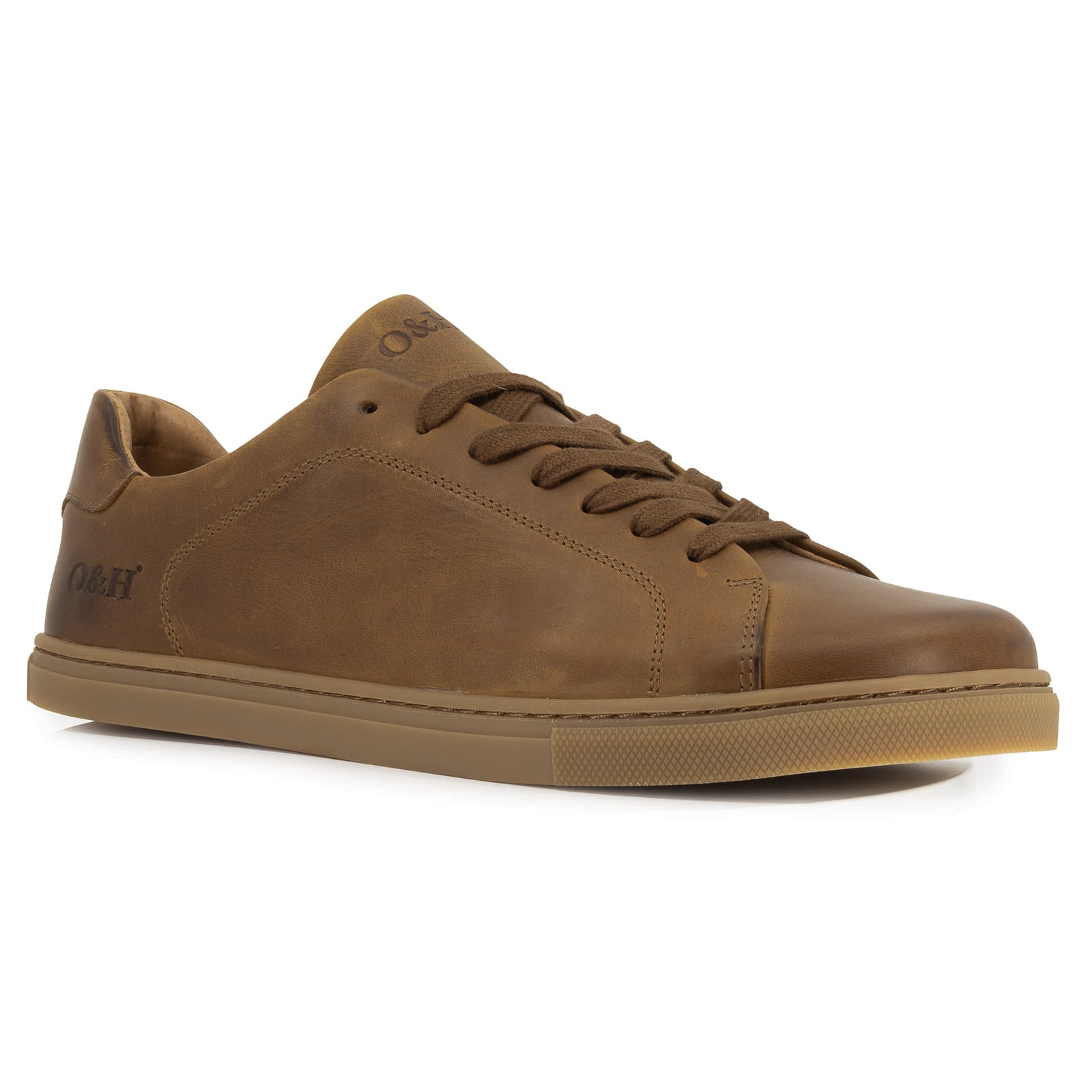 angled view of rowan barefoot trainers in tan showing front lace detail