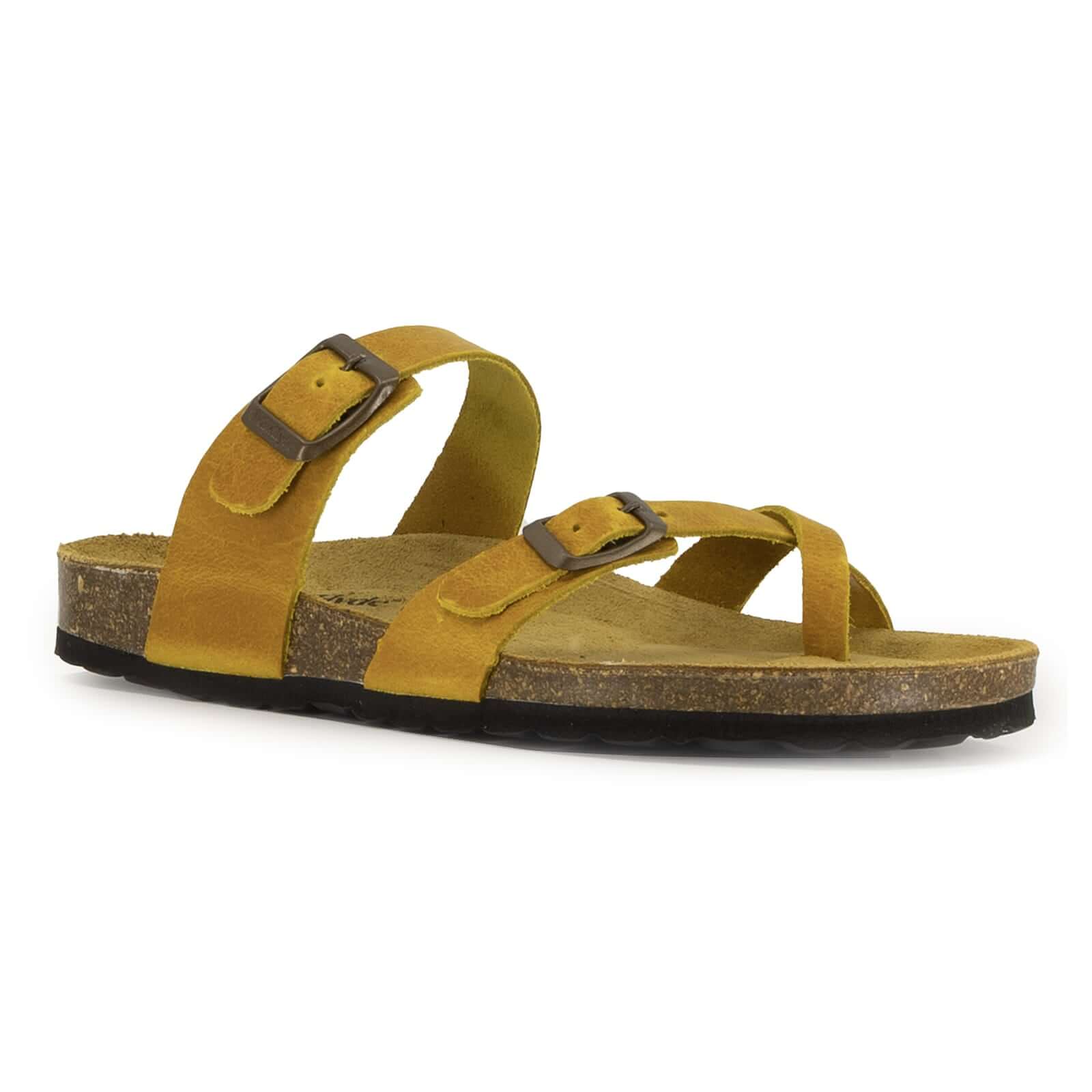 angled side view of yellow savannah 2 footbed sandals showing upper and buckle detail
