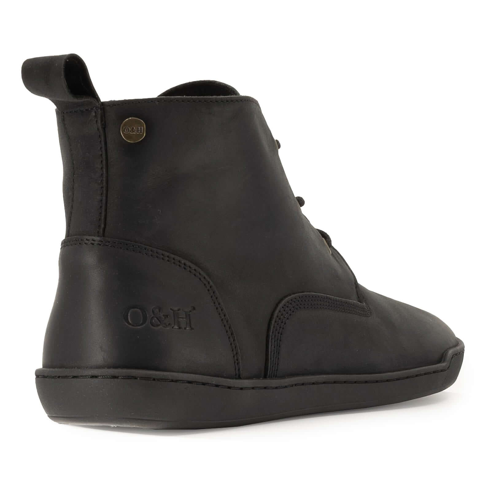 rear view of spruce barefoot chukka boots showing O&H branding and leather upper