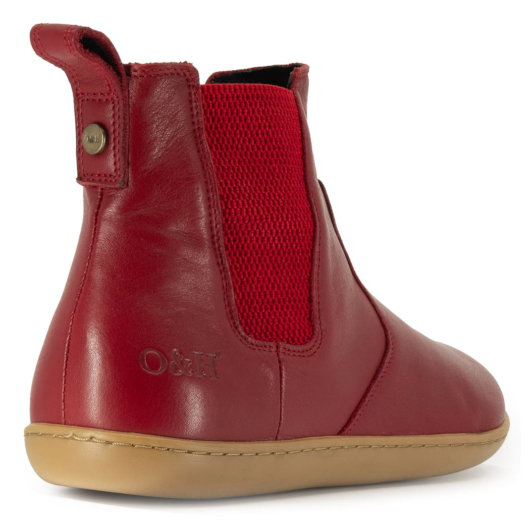 heel view of willow 2 red barefoot boots showing O&H brass pin and branding