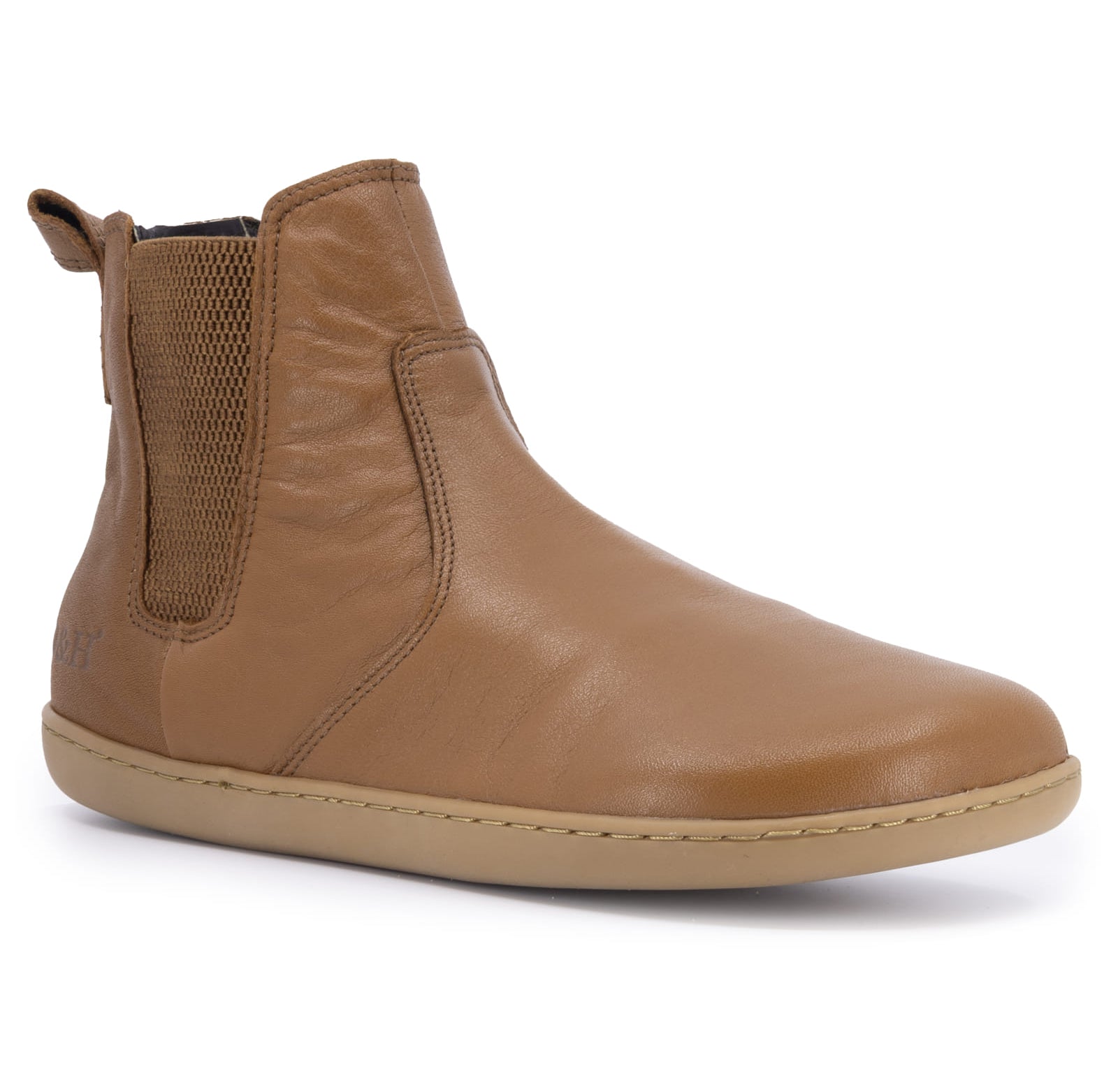 angled image of tan barefoot boots with gum outsole