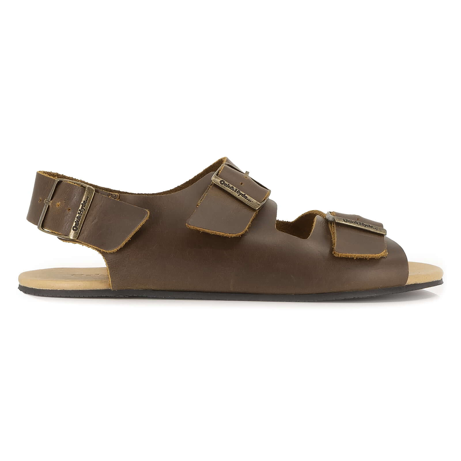 side profile of brown oak & hyde wisteria barefoot sandals with triple adjustable straps and zero drop sole