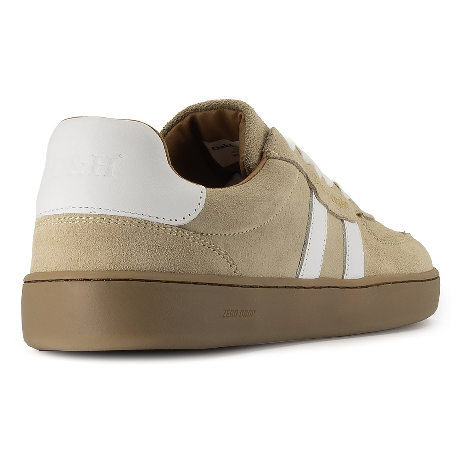 heel view of womens larch barefoot trainers in beige showing white panel detail and logo