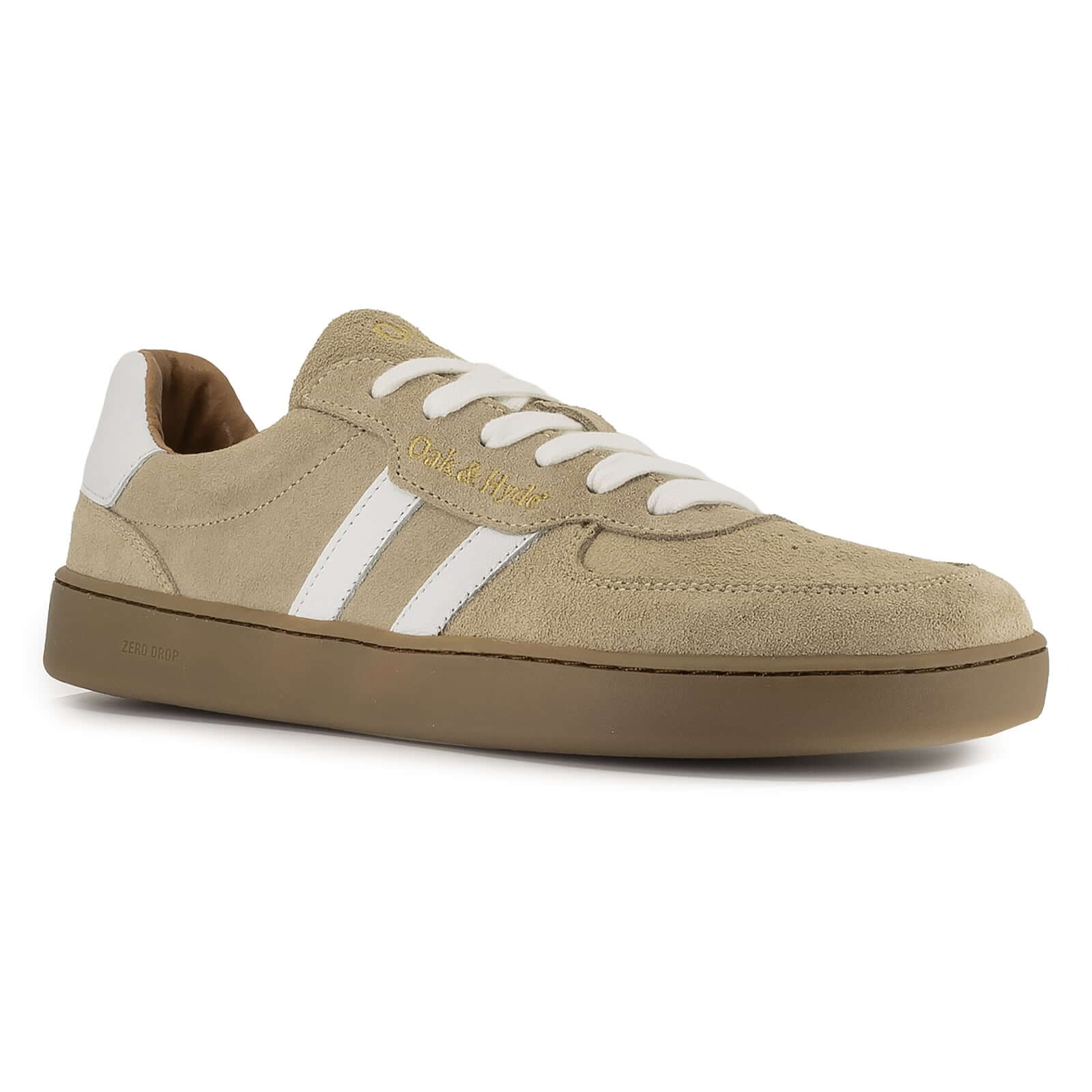 side angled view of womens larch barefoot trainers in beige showing white contrast stripe detail
