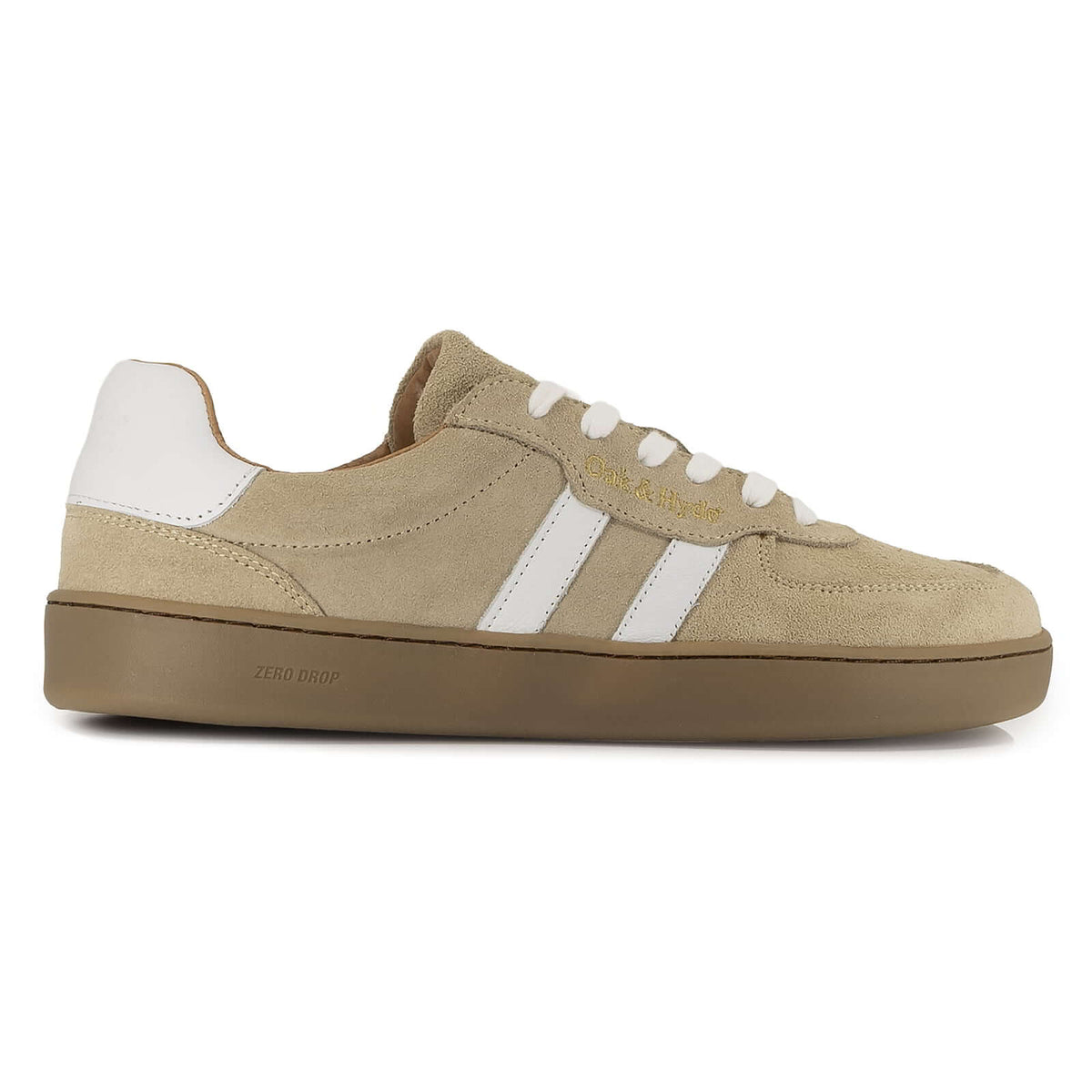 side profile view of womens larch barefoot trainers in beige showing suede leather upper