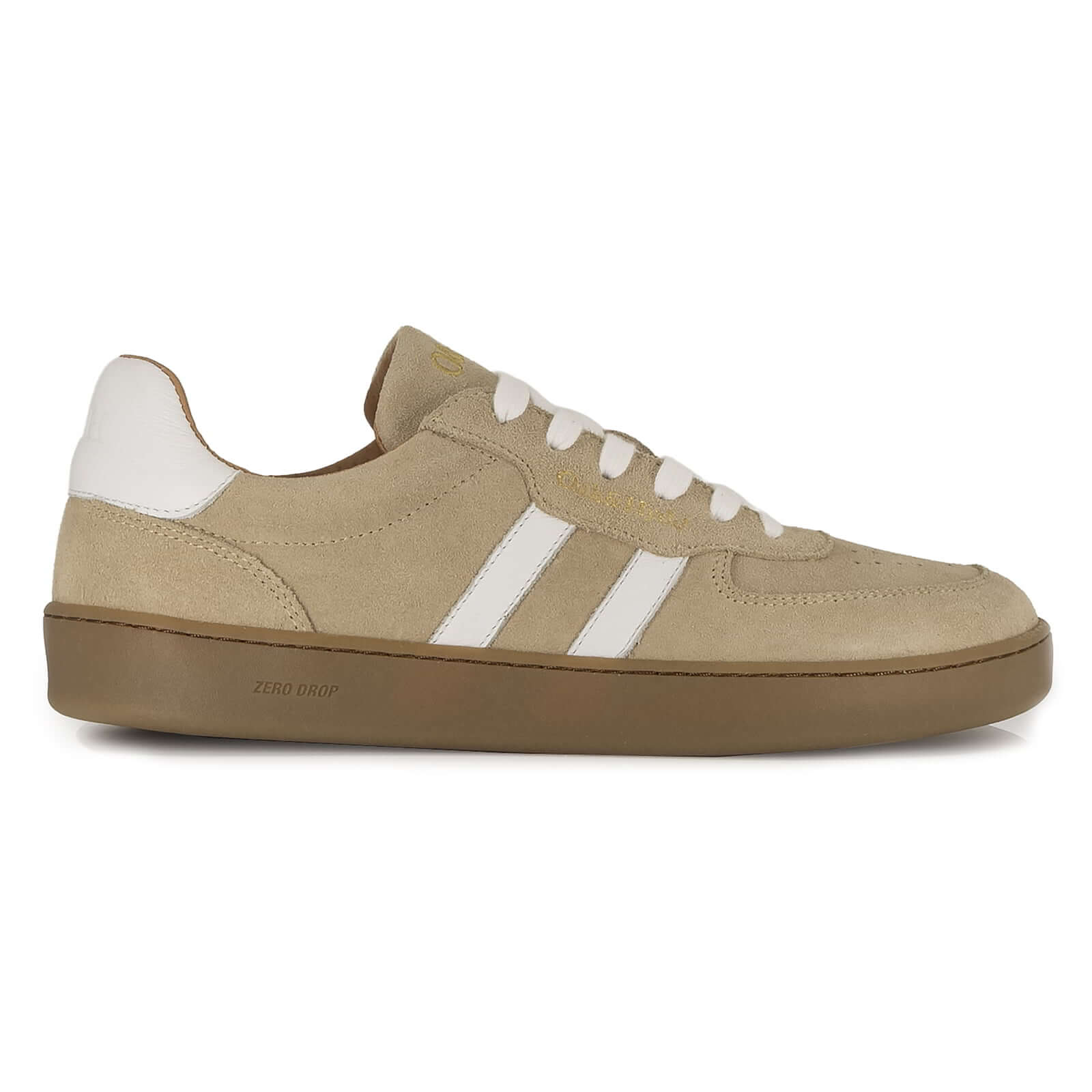 side profile view of womens larch barefoot trainers in beige showing suede leather upper