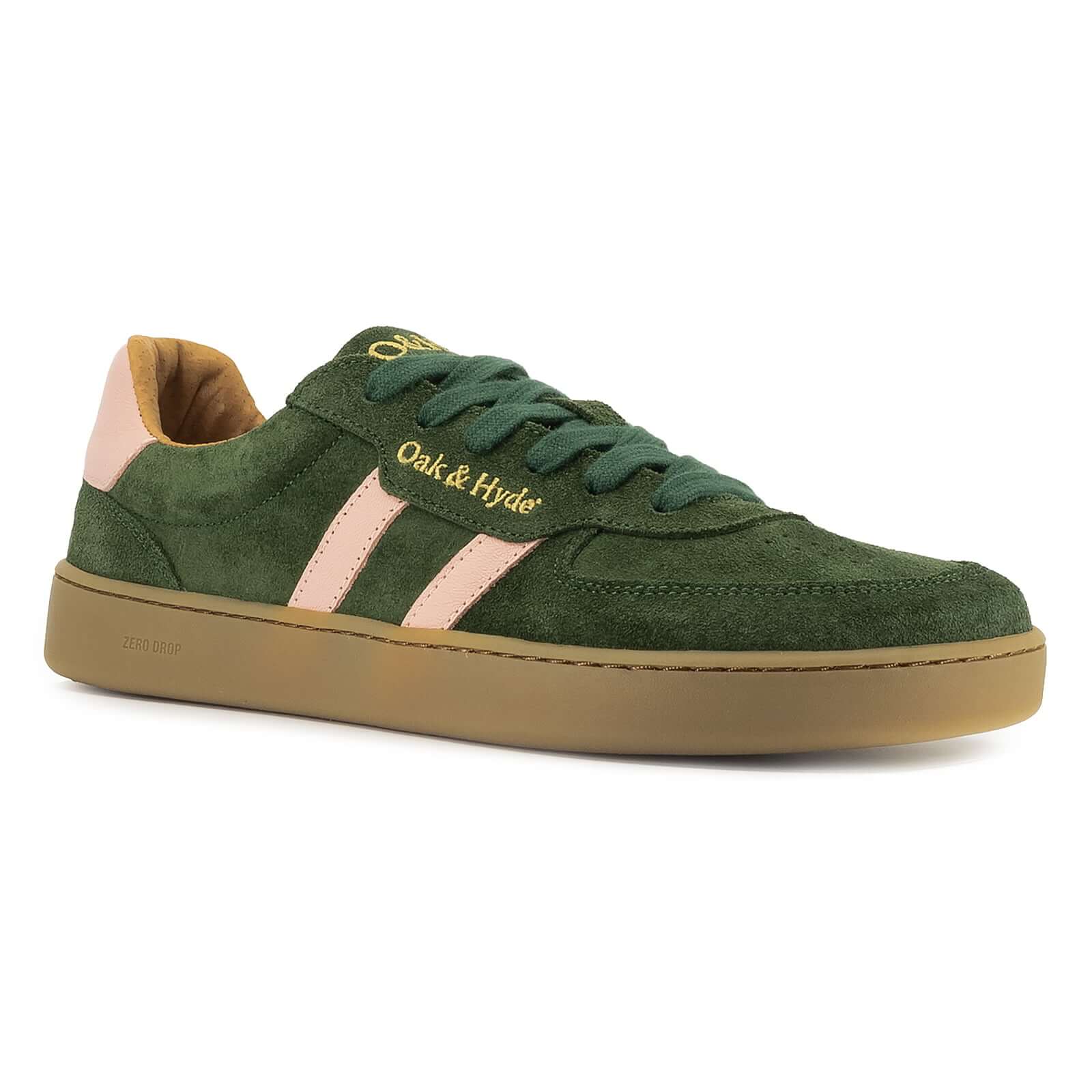 side angled view of womens larch barefoot trainers in green showing pink stripe detail and logo