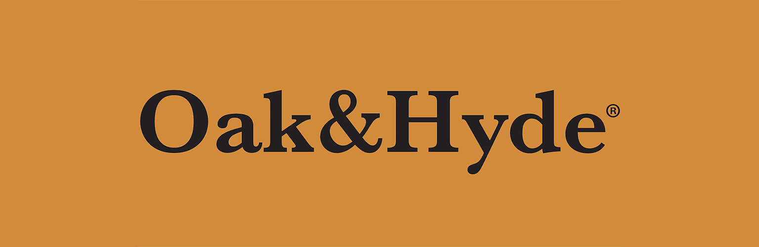 Oak & Hyde logo in black with orange brand colours background