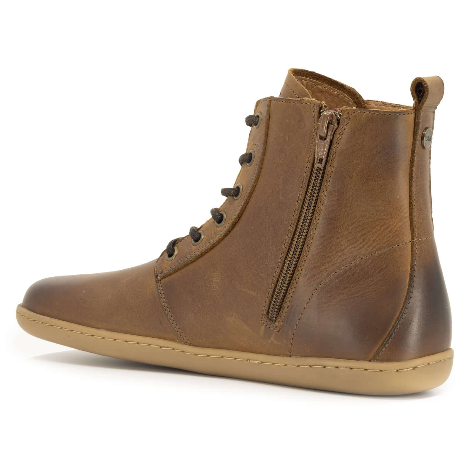 angled inside view of cherry barefoot boots in tan showing full inside zip and heel pull tab