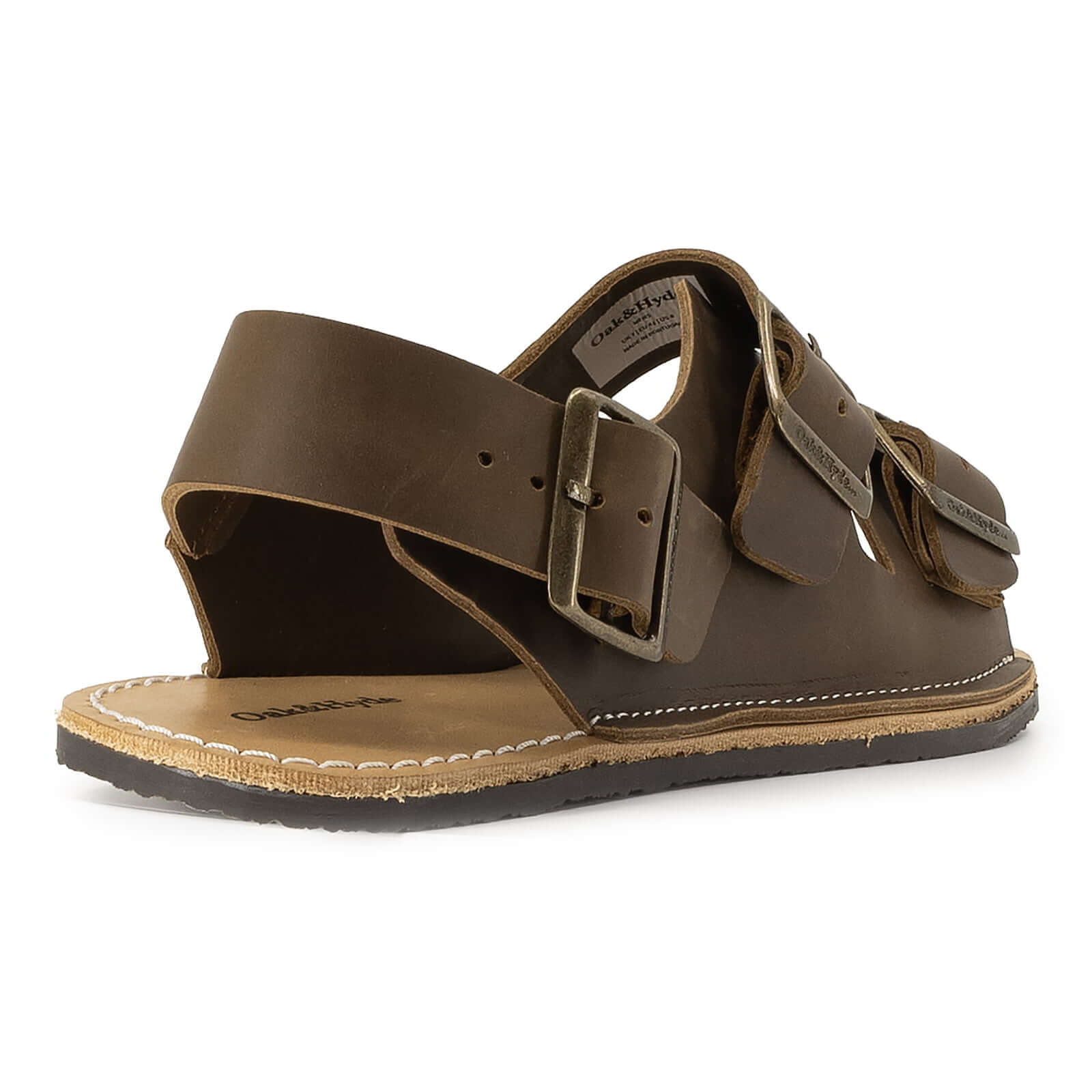 heel view of mens acacia back strap sandals in brown showing heel strap and foot entry area