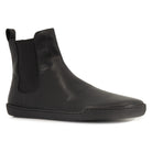 front angle image of black chelsea boots showing pull tab on white background