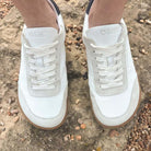 model wearing aspen barefoot trainers in white top down view showing toe shape