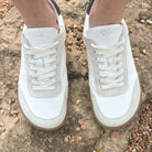 model wearing aspen barefoot trainers in white top down view showing toe shape