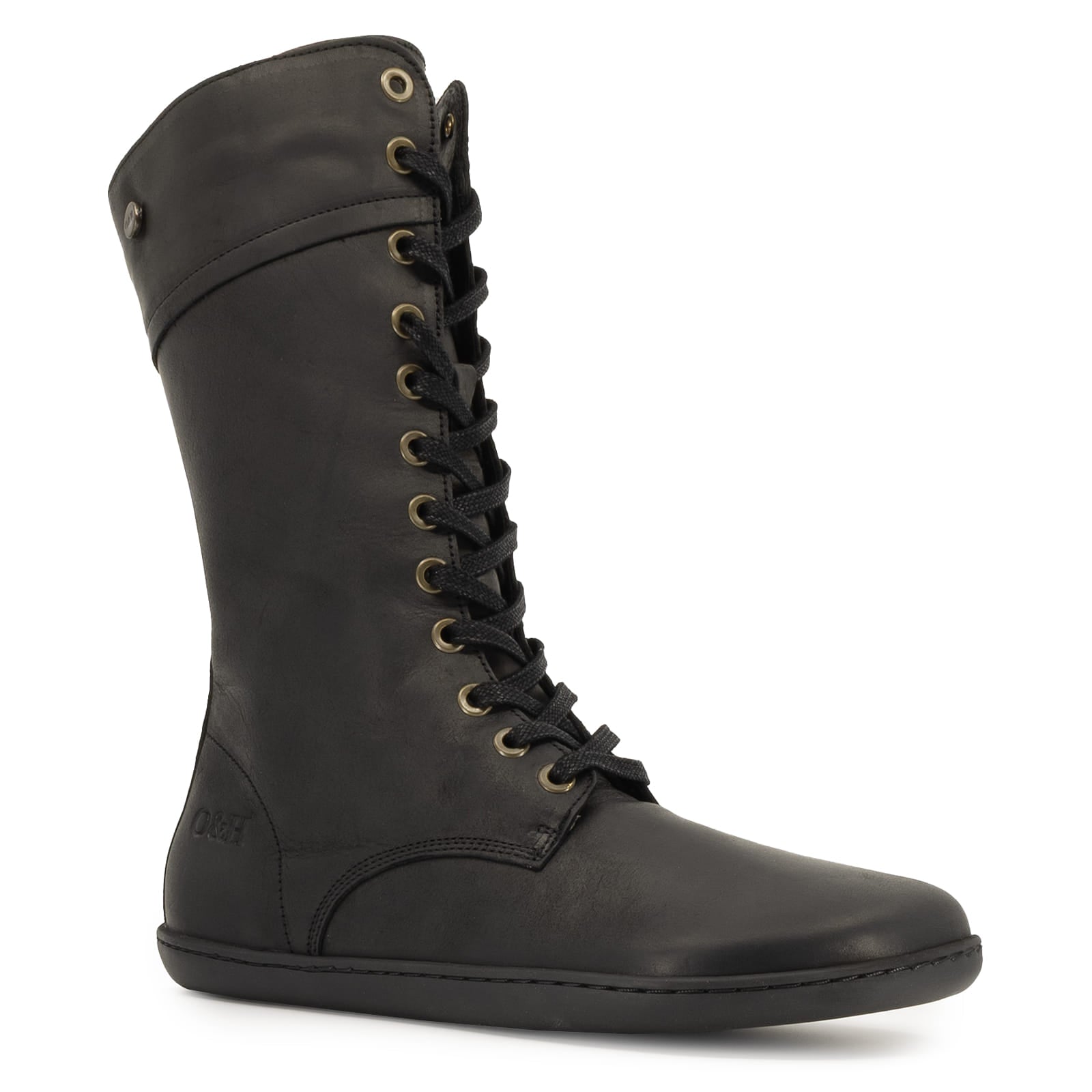 angled view of beech 12 barefoot boots in black showing front lace on white background