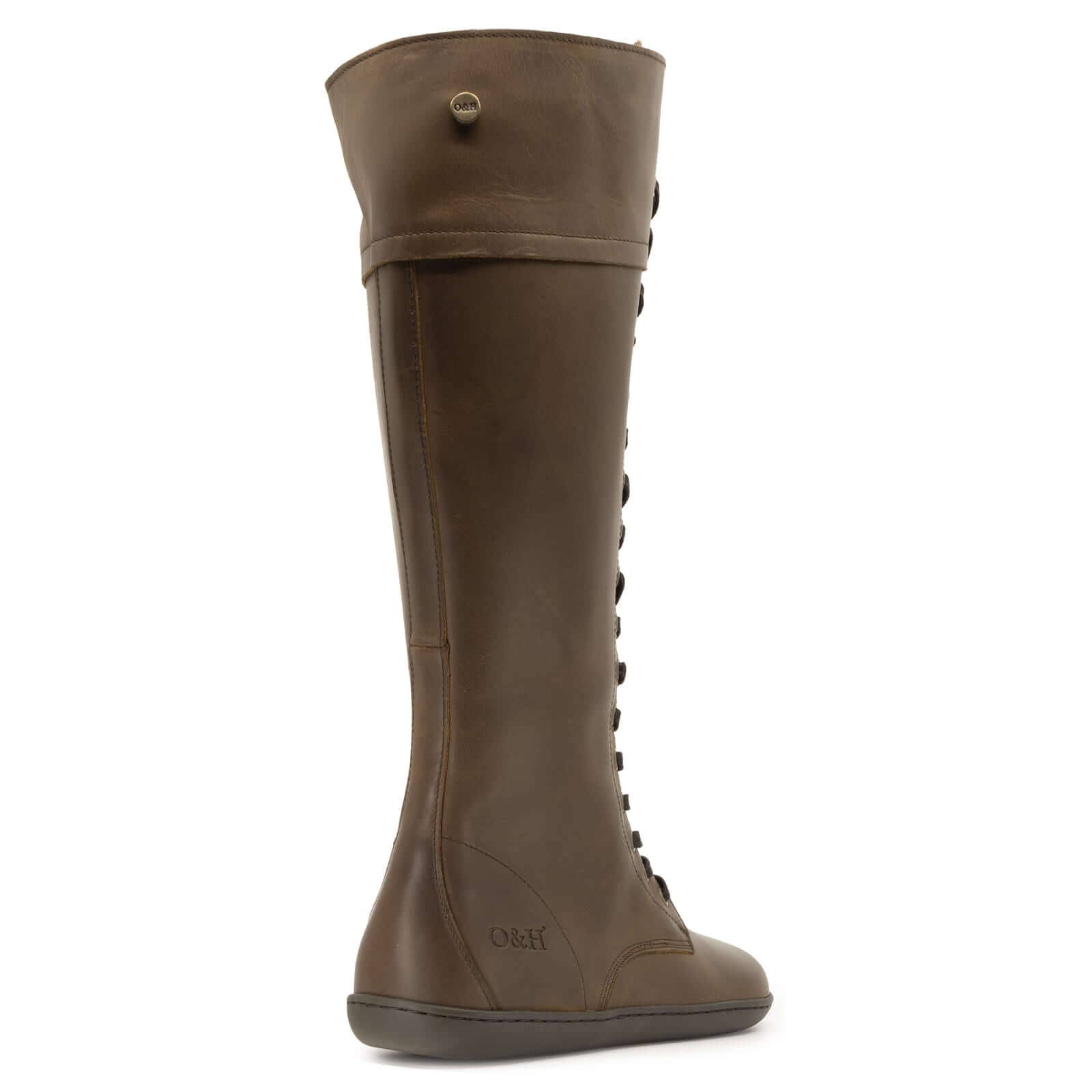 rear view of tall brown barefoot boots showing leather upper and panel details
