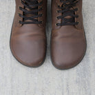 model wearing beech 18 brown barefoot boots top down view showing toe shape