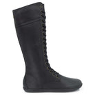 side view of tall lace up barefoot boots on white background