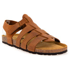 Tan leather fisherman sandal with adjustable strap on white background