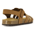 rear angle view of tan oak & hyde castro sandals showing heel strap fastening and cork sole