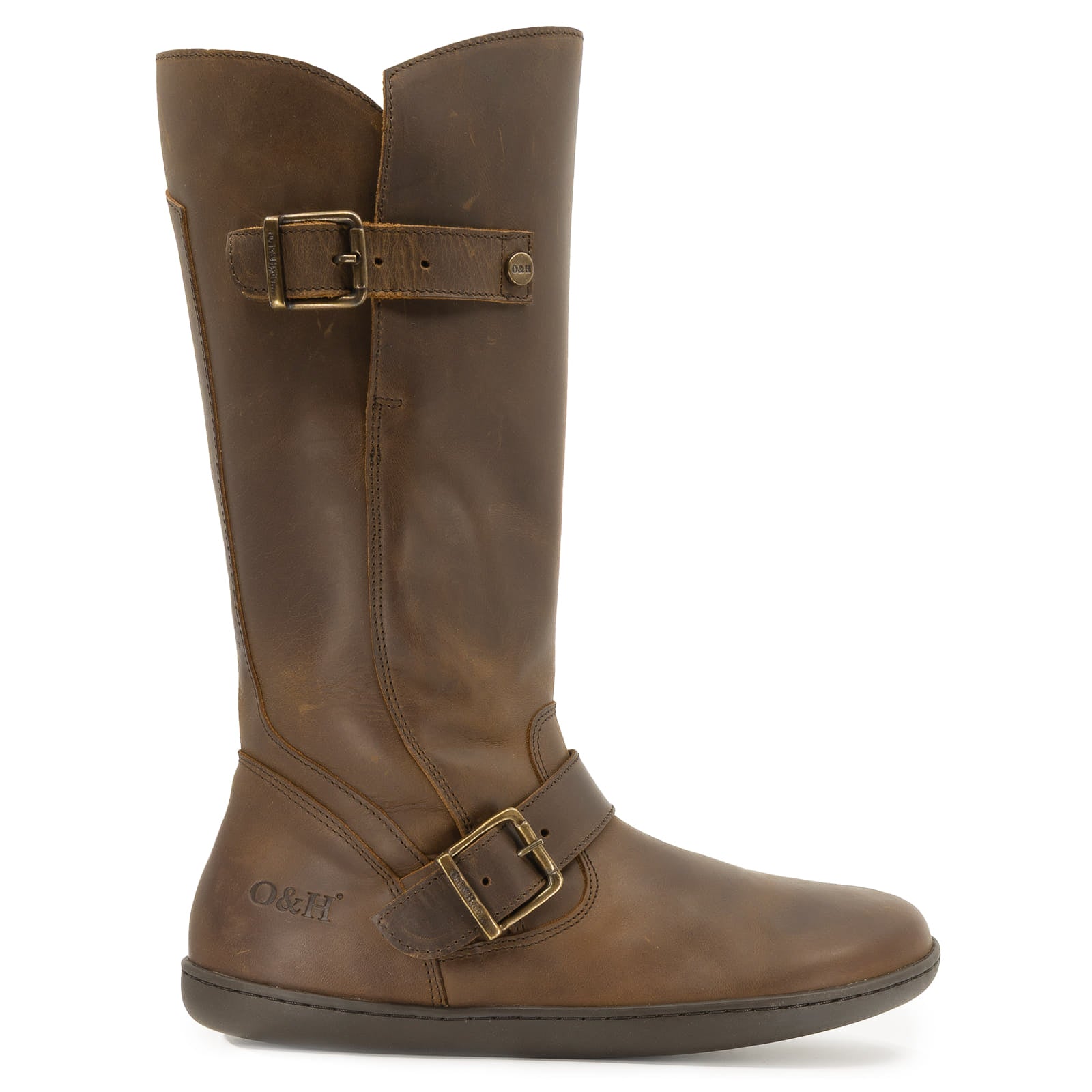 side view of dark brown cedar barefoot boots showing buckle detailing and upper design